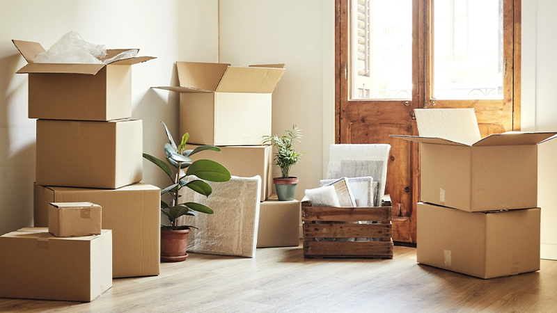 moving boxes on the floor of an apartment