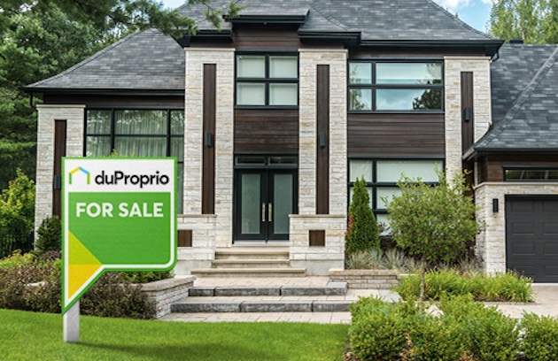 Someone estimating the value of a modern home for sale