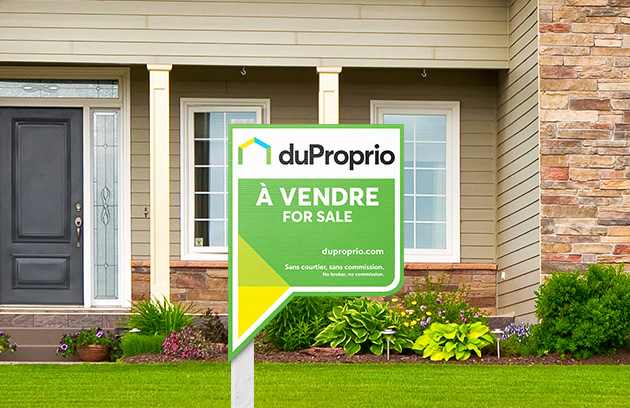 House for sale with Duproprio sign