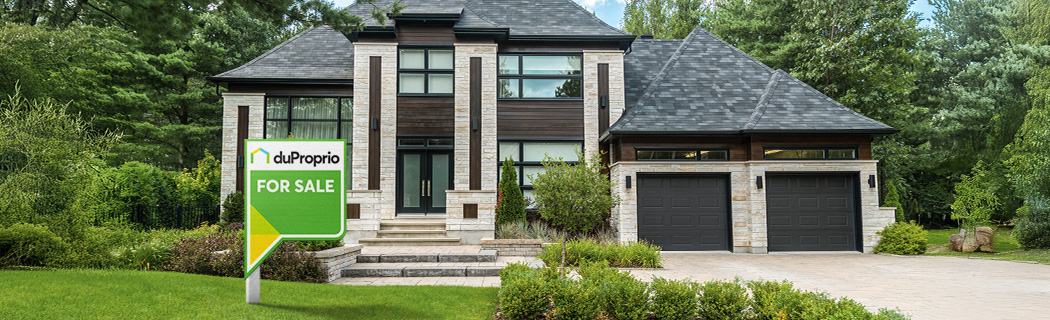 Someone estimating the value of a modern home for sale