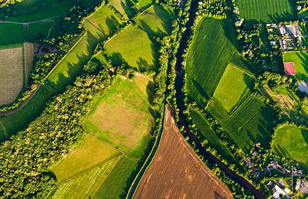 Aerial view over land and lots