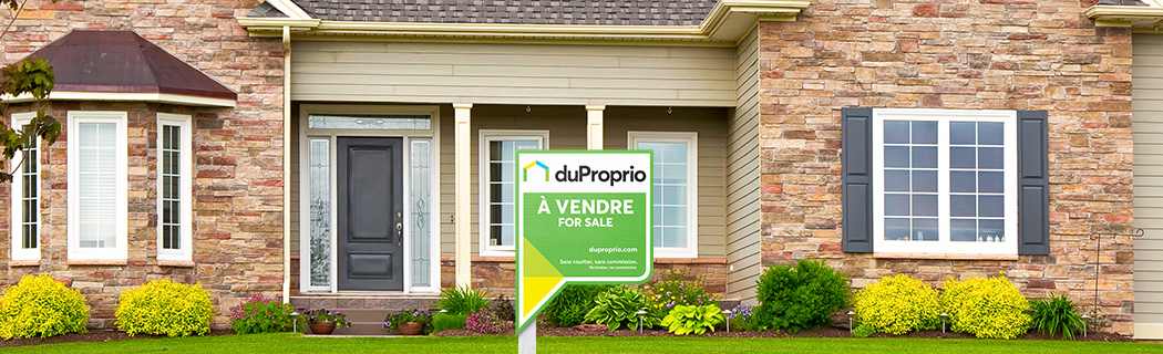Duproprio sign in front of a house for sale